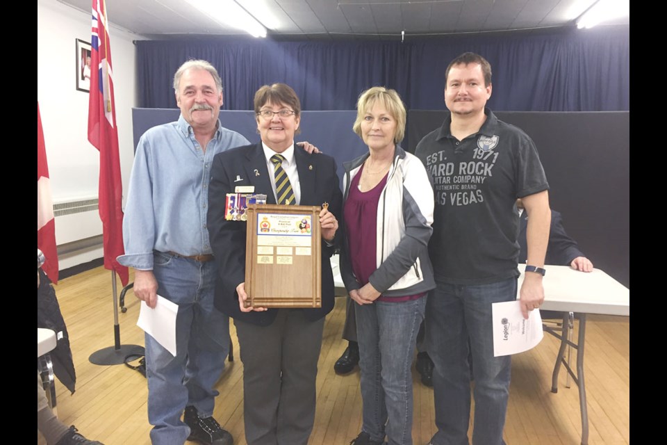 The winning team from the Estevan Legion included, from left, Doug Cairns, provincial representative Roberta Taylor, Burva Connor and Burt Blondeau. Submitted photo