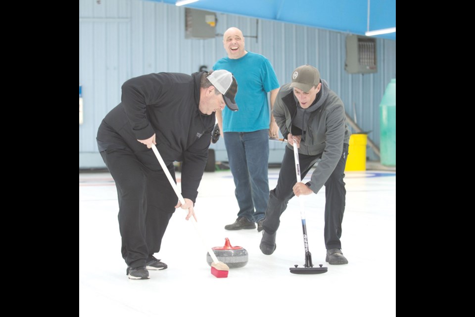 From left, Stuart Kaip, Tony Sernick and Jason Thompson were entered in the bonspiel.