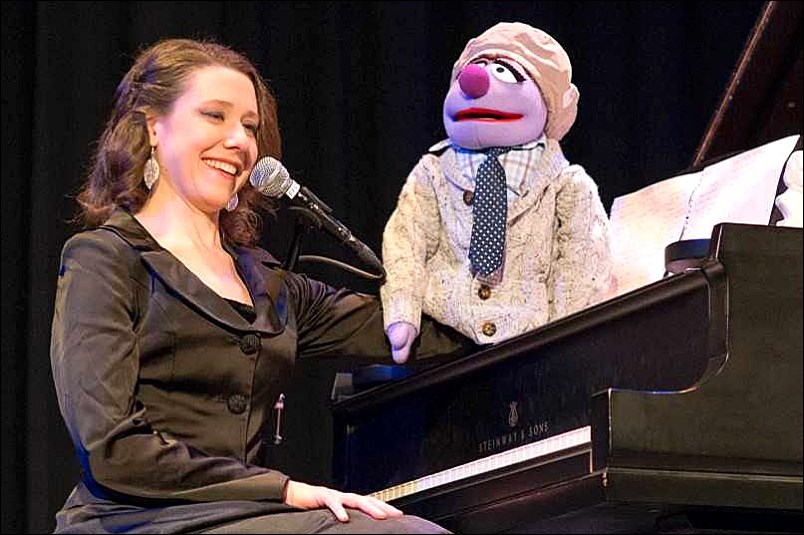 Fringe performer and musician Sarah Hagen and her puppet pal brought their comedic takes on classical pianists to the R.H. Channing Auditorium on April 14. - PHOTO BY NOELLE DRIMMIE