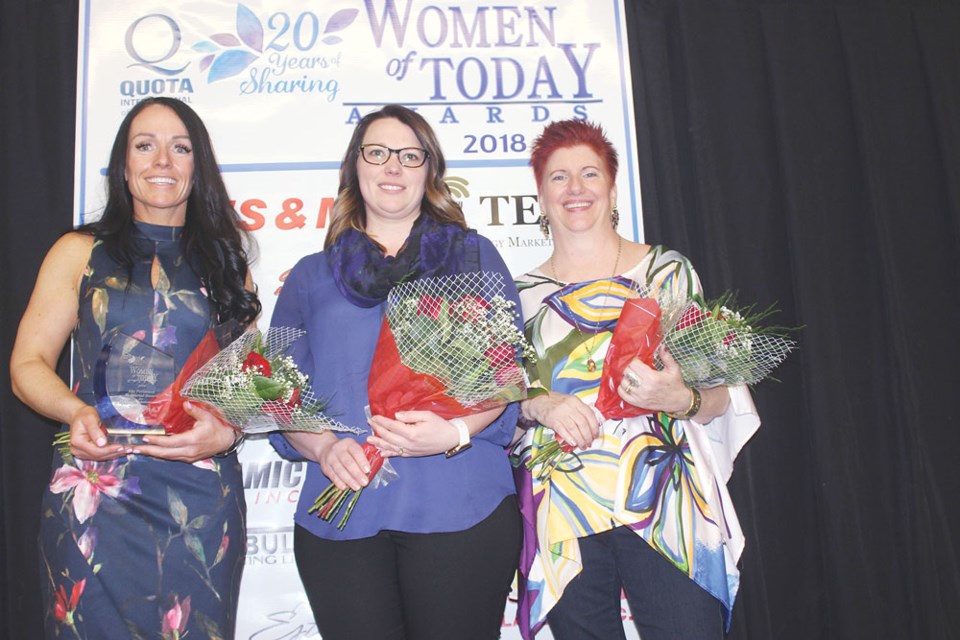 Jennifer Olfert (Ida Petterson Memorial Award for Outstanding Entrepreneur), Kim Locken (TS&M Award for Outstanding Contribution to the Workplace) and Gale Tytlandsvik (Southern Plains Co-op Award for Outstanding Contribution to the Community) were among the recipients of this year's Women of Today Awards. 2) Mackenzie Holman, left, accepts the Shirley Orsted Memorial Award for Outstanding Young Woman of Today from Michelle Orsted, who is a granddaughter of Shirley Orsted.