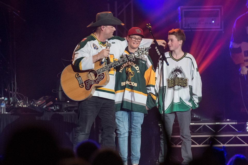 Gord Bamford was just one of the many Canadian country artists that took to the stage for the Country Thunder Humboldt Broncos tribute concert on April 27 at Sasktel Centre in Saskatoon. Pictured (L to R): Gord and Nash Bamford, and Carson Haugan photo by Steve Hiscock/SaskTel Centre