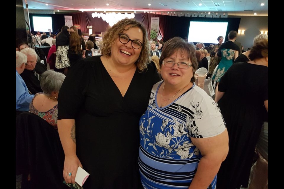 Melissa Coober-Bendtsen, Chief Executive Officer of the YWCA in Regina, the host organization of the Women of Distinction awards gala, spoke with Cindy Koreluik, a nominee, on April 26 at the awards gala in Regina.