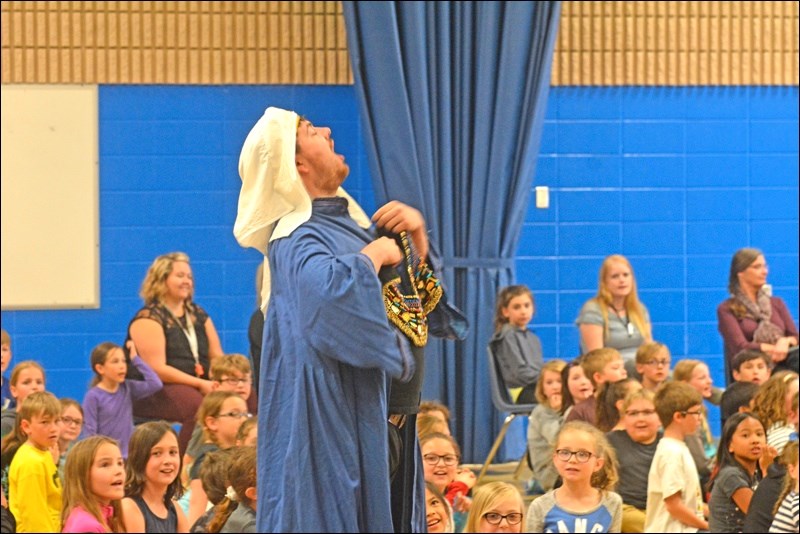 The Scorpions’ Sting is an opera for children staged by Saskatoon Opera. There were performances last week at Notre Dame and Ecole Monseigneur Blaise Morand. Pictured is Chris Donlevy stirring up the audience, along with performers Emma Johnson and Jean van der Merwe, who attended EMBM approximately 10 years ago. Photos by Josh Greschner