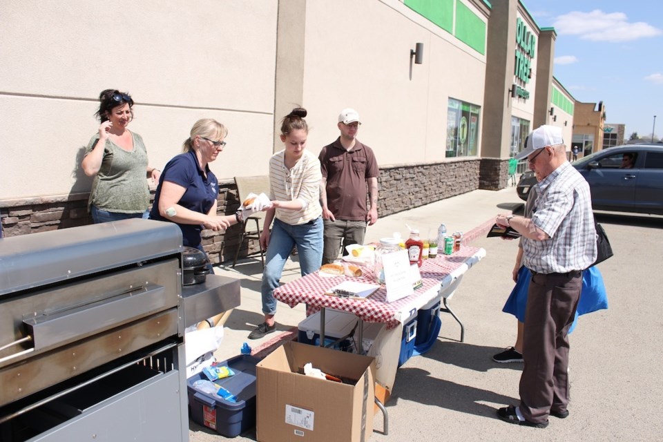 A barbecue in support of the Brayden Ottenbreit Close Cuts for Cancer was held on May 12 in front of the Bell Store.