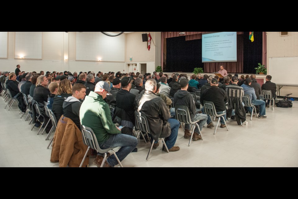 This wide shot does not include the additional rows at the back of the room, full of potential contractors who, on Feb. 15, 2017, were eager to find work on the proposed refinery. The man standing at the front, under the screen, was Keith Stemler, now-former CEO of Dominion Energy Processing Group, Inc.