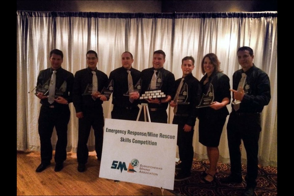 Lentowicz, second from right, accepting first place in a fire fighting event at the Saskatchewan Mining Association’s emergency response/mine rescue skills competition. - SUBMITTED PHOTO