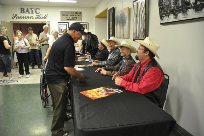 The Sons of the Pioneers signing autographs in North Battleford at the Western Development Museum in August of 2015. They played to a sold out crowd. Photo by Jayne Foster