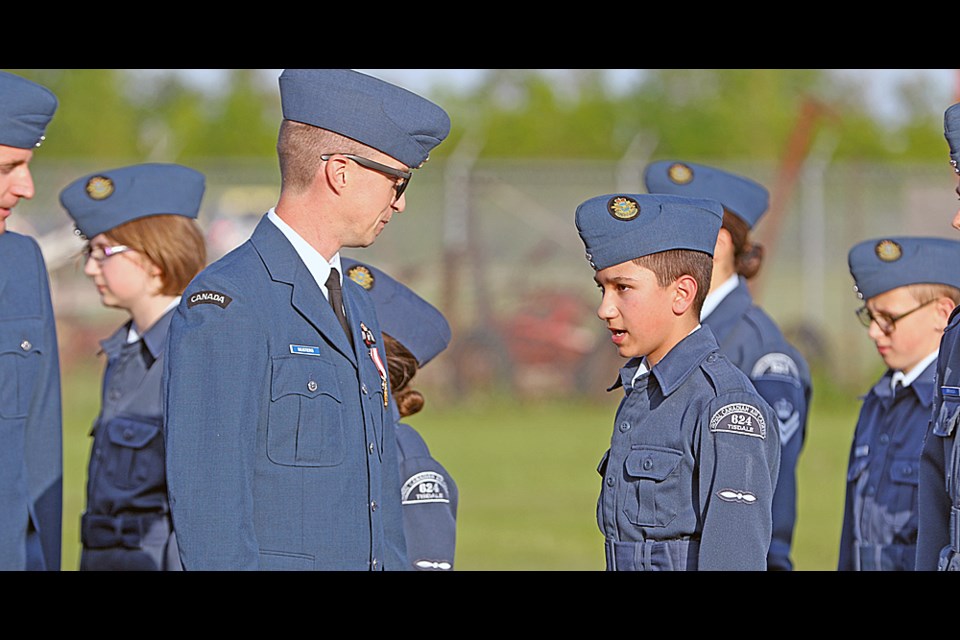 Cpt. Peter Musters inspects the #624 Tisdale Air Cadets at their annual ceremonial review. He came to the event in a military helicopter. Photo by Devan C. Tasa