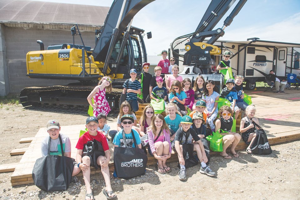 Several classes from Redvers School made their way to the show. Here, the Grade 3 class checked out Northern Mat & Bridge LP.