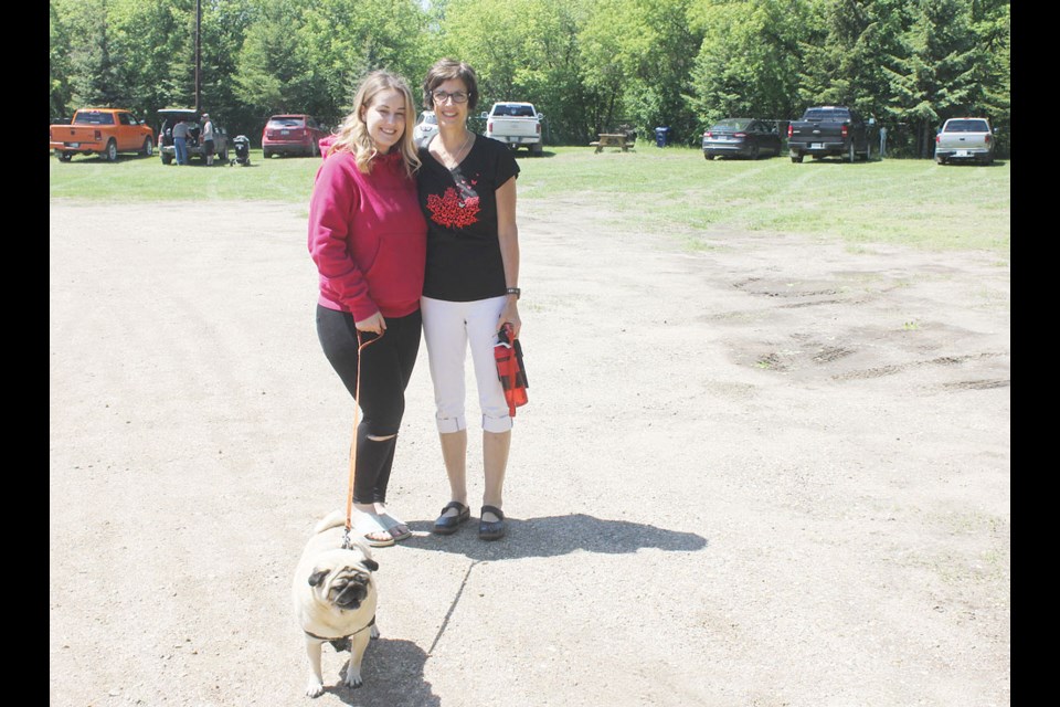 Allison and Linda Mack walked Archie.