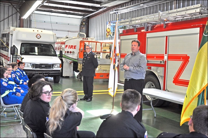 Mayor Ryan Bater adressess Emergency Services Responder training students at their graduation program Tuesday. Photos by John Cairns