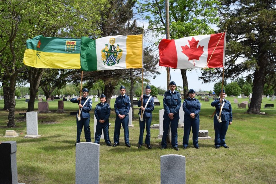 The Canora air cadets took part in the Decoration Day service at the Canora Cemetery on June 10 and raised the local, provincial and national flags. From left, are: Sgt. Gracie Paul with the Saskatchewan flag, AC Kaulen Katryniuk, FCpl. Jamie Katryniuk, FCpl. Tessa Spokes with the town of Canora flag, Sgt. Juan Mesa, LAC Janis Ruiz and FSgt. Joanne Babb with the Canadian flag.