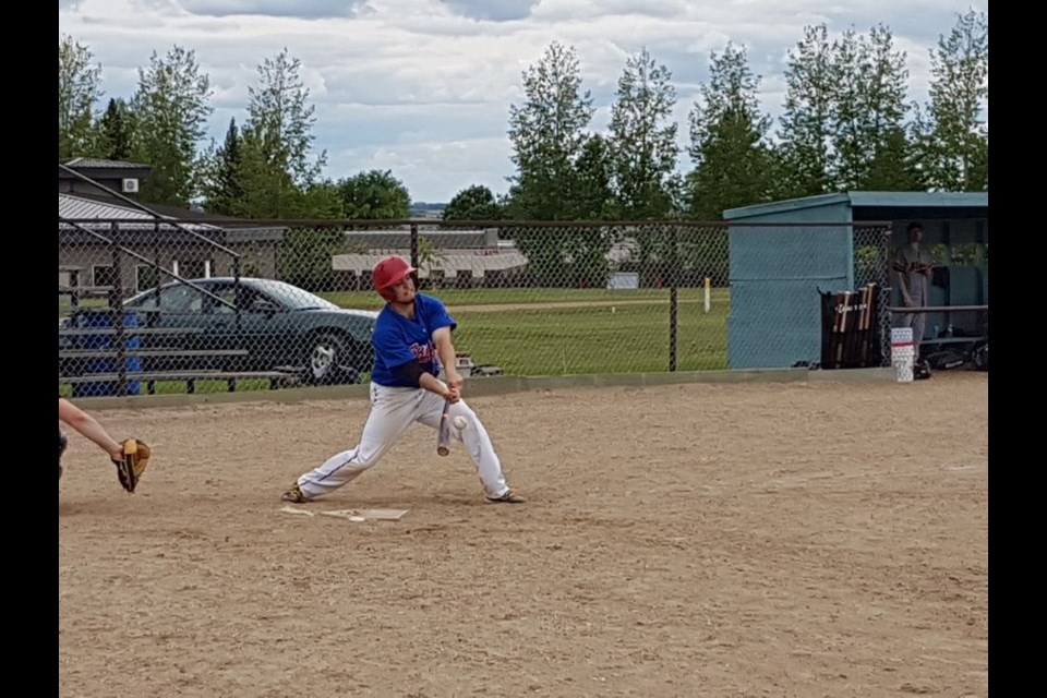 Logan Parachoniak who plays second base for the Canora Supers hit a second base put-out for the last out in the 6th inning of the first game of a double-header played in Kamsack on June 16.