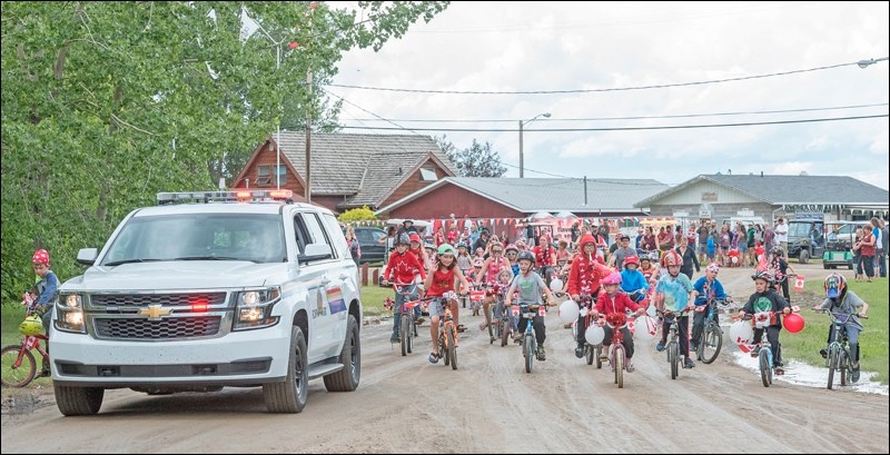 Police lead the parade.