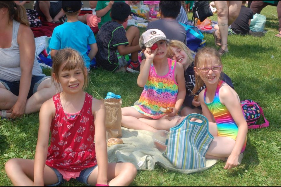 Enjoying a picnic lunch during the Preeceville School elementary achievement day on June 21, from left, were: Savannah Neilson, Hailey Spray, Sydney Koloski and Anebeth Bartel