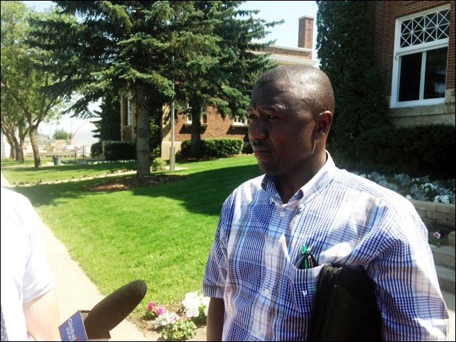 Thomas Bumbeh of the Edmonton Liberian Society spoke to media after providing a victim impact statement during the Stucka sentencing.