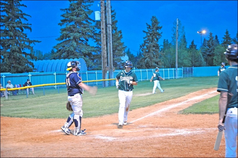 Despite some threatening skies the game between the North Battleford Beavers and Wilkie Brewers went ahead Friday at Beaver Lions Stadium. Gavin Wourms went the full nine innings pitching for Wilkie, who scored five runs in extra innings to pull out an 8-5 win. Photos by John Cairns
