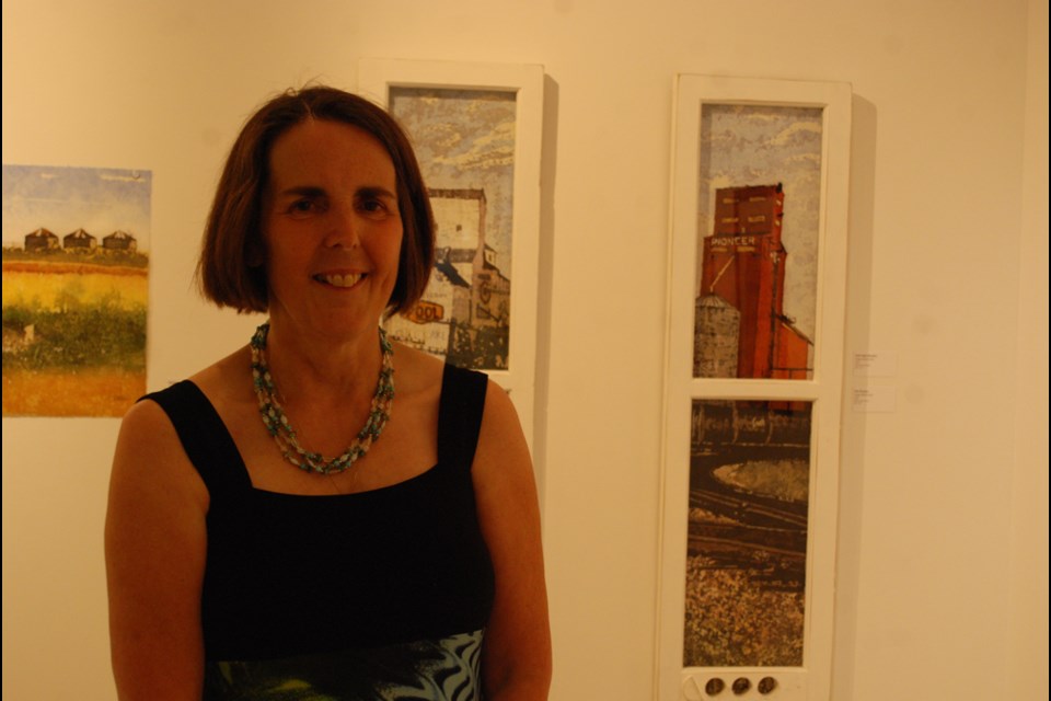 Paige Mortensen talked about her work during the Humboldt and District Gallery reception for their joint exhibit, Looking Back, Looking Out, Looking In on July 5.