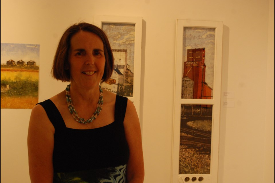 Paige Mortensen talked about her work during the Humboldt and District Gallery reception for their joint exhibit, Looking Back, Looking Out, Looking In on July 5.