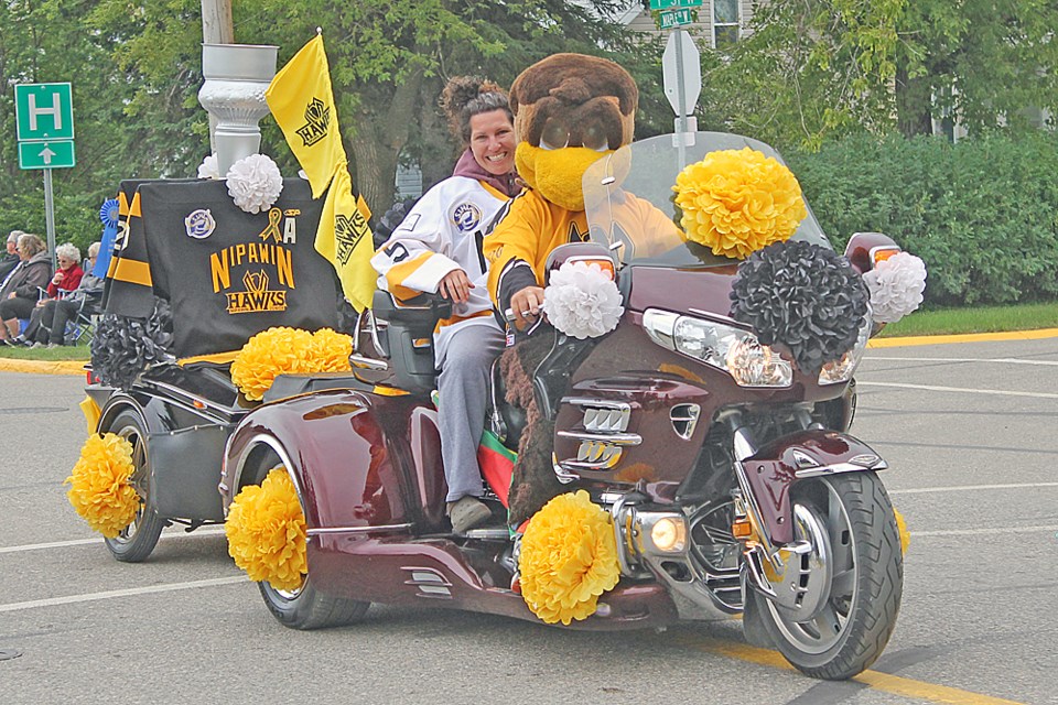 The Nipawin Hawks on their bike-float. Photo by Jessica R. Durling