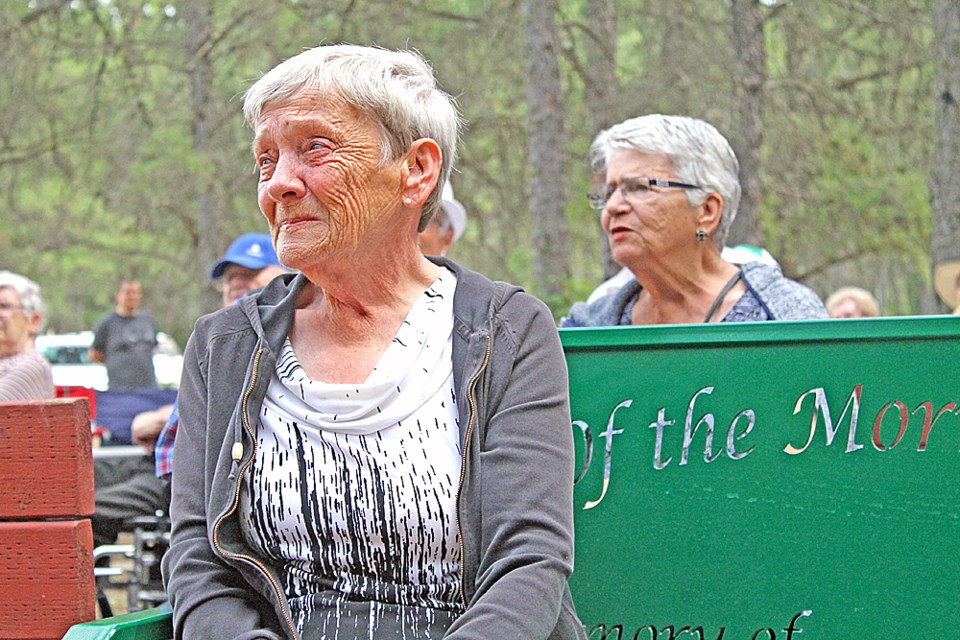 Jean Miskiman sits on the bench dedicated to her late husband at the Nipawin Regional Park’s 50th annversary party. Photo by Jessica R. Durling