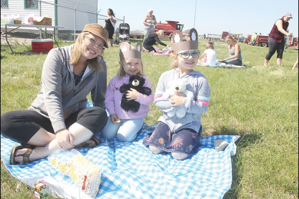From left, Ashley Stark, Layla Sark (with Bearie) and Piper Stark (with Uni) attended the picnic.
