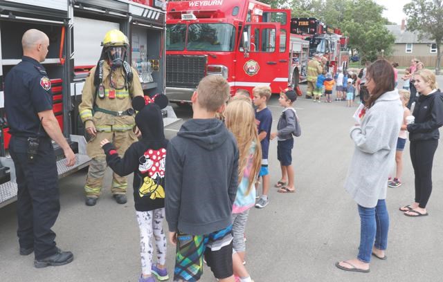 College for Kids at fire trucks