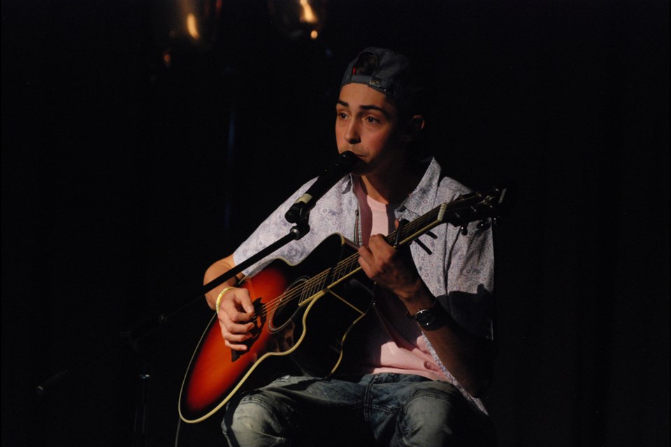 Ethyn Beggs plays in front of his peers on June 7 during Humboldt Collegiate Insitute’s variety night. He will be one of the competitors at the Living Skies Teen Vocal showcase final in Kenaston on Aug. 4. photo by Becky Zimmer