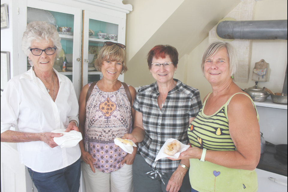 From left, Betty Kramer, Norma Rosengren, Donna Ereth and Judy Venaas enjoyed fried bread dough while in Midale.