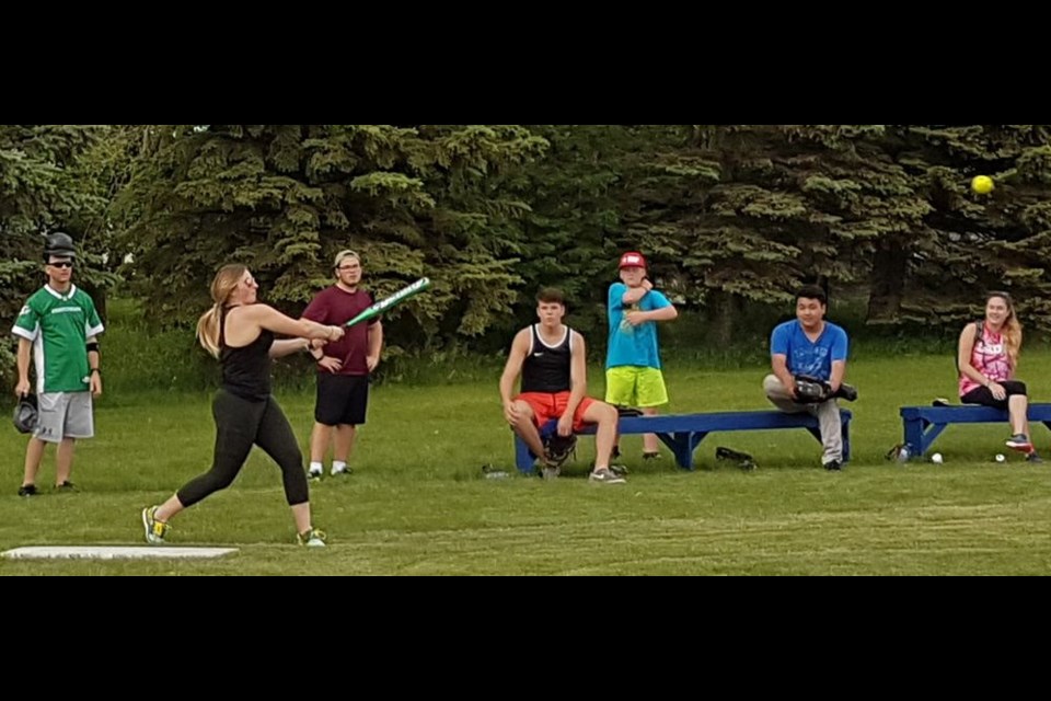 Taylor Hudye connected with the ball for Team Orange at the annual SADD baseball game held at KCI on June 15.