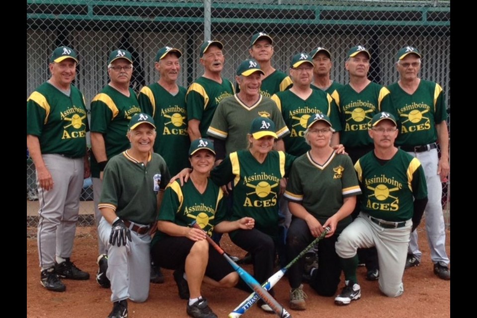 The Assiniboine Aces slo-pitch team won bronze at the SSFA (Saskatchewan Senior Fitness Association) provincial games in Moose Jaw from July 10 to 12, with a number of members from Canora and the surrounding area. From left, are: (back row) Darryl Stevenson of Burgis Beach, Warren Knight of Invermay, Brian Suer of Humboldt, Alvin Van Caeseele of Churchbridge, Gord Barnes of Kamsack, Lloyd Hanson of Invermay, Royce Knight of Invermay and Victor Korchinski of Canora; (middle) Art Boyd of Endeavour and Brad Gall of Yorkton, and (front) David Weiman of Danbury, Helen MacIntosh and Lorraine Wollbaum of Regina, Avis Howe of Moose Jaw and Dwayne Murias of Wadena.