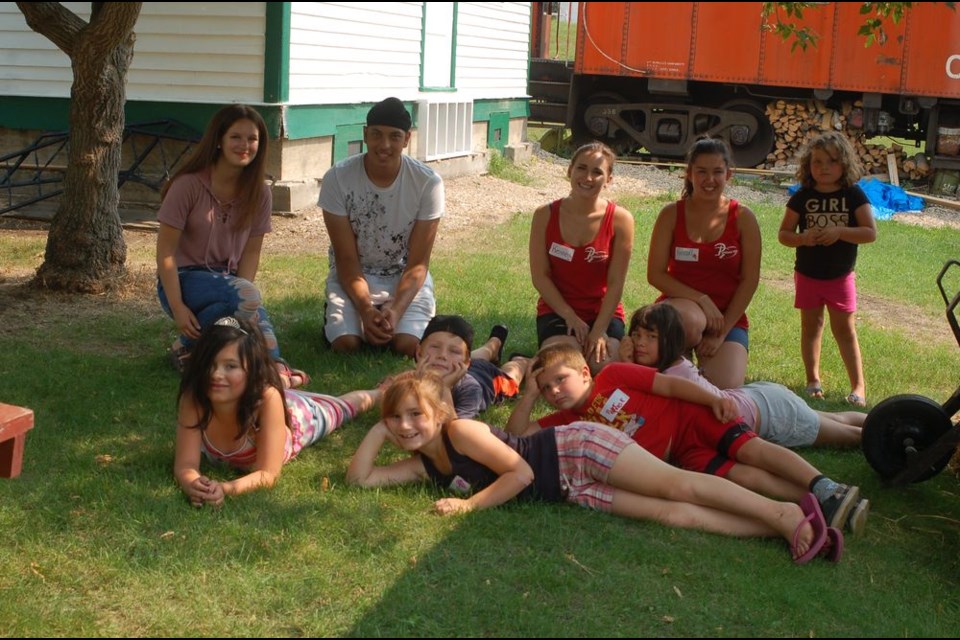 Kennedy Kosheluk (back row, middle) and Kendall Schneider (right of Kosheluk) organized and instructed a summer fun program for children in Sturgis.