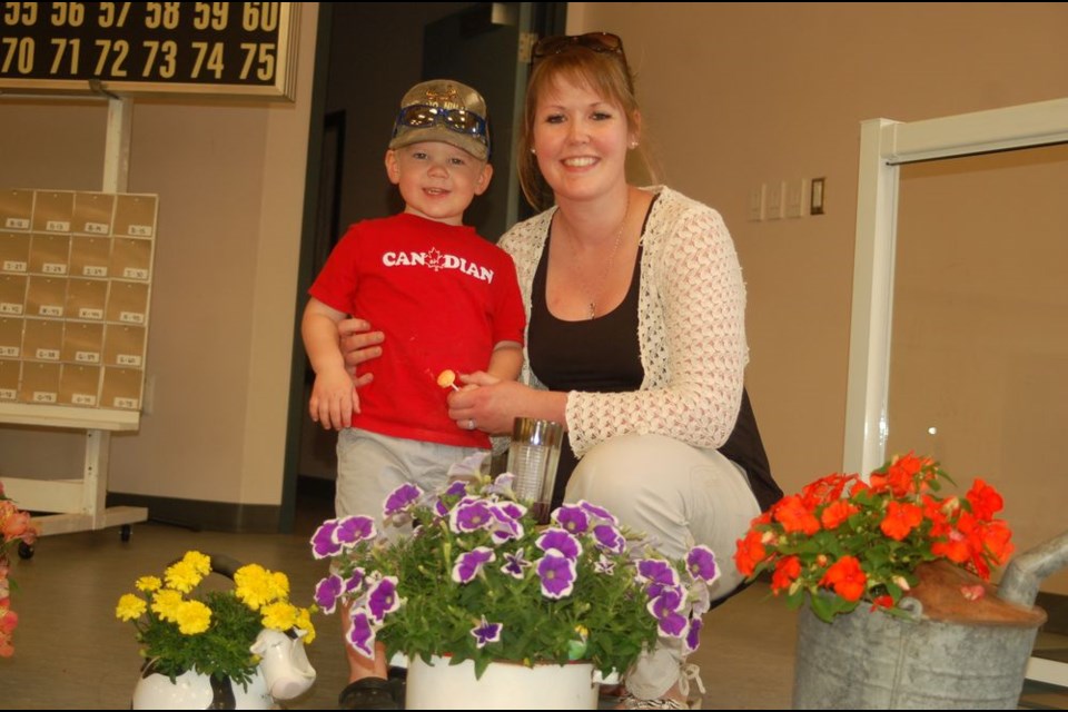 Will Prestie and his mom Leah Prestie were photographed with his first place flowers at the Sturgis Horticultural Society annual show.