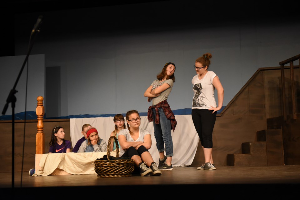 Souris Valley Theatre’s Act 3 youth summer camp students participate in a musical number during a dress rehearsal for their performance of Lost and Found: A Neverland Adventure.