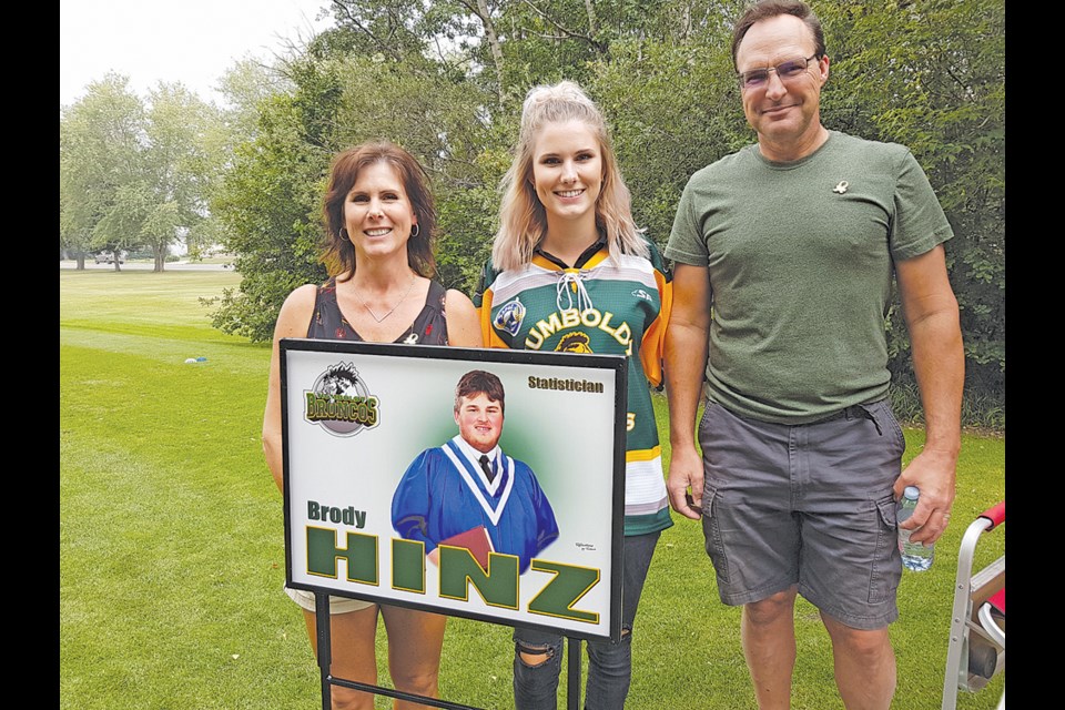 It was a family affair for the Schulers with Tayna, Faith, and Todd lending a hand to honour Brody Hinz and the Humboldt Broncos.