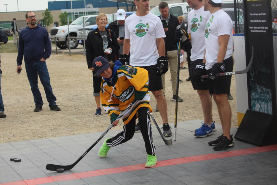 (Centre) Hockey players were given the chance to test their skills against current and former NHL stars during Humboldt Hockey Day.