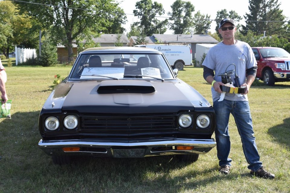 The award for the best 1960s vehicle went to Earl Goretzky of Canora and his 1969 Plymouth Road Runner at the Cruisers Car Club Show and Shine in Canora on August 19.