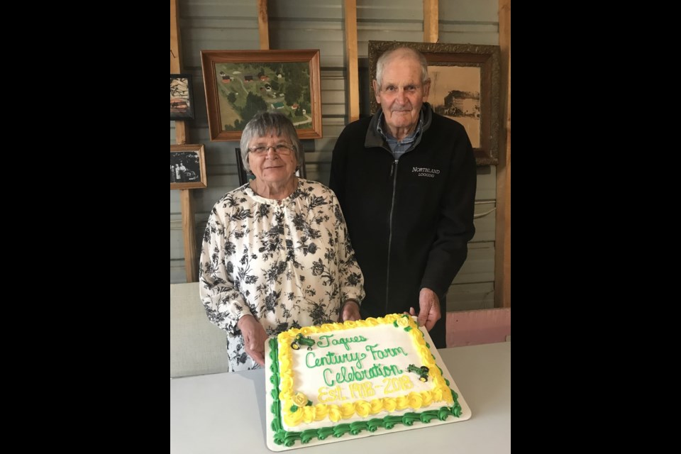 Jeannette and Jack Jaques were photographed with the family’s centennial cake.