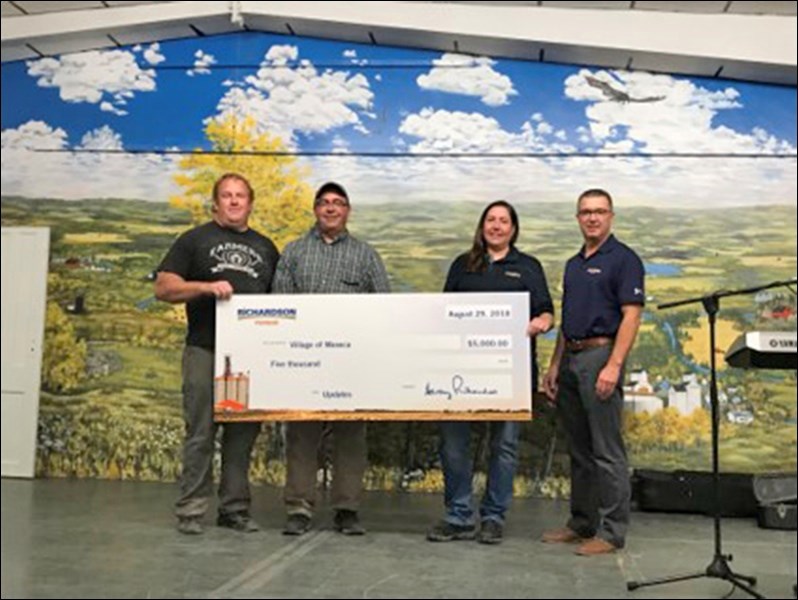 During Waseca Community Day, a presentation was made by Richardson Pioneer to the Village of Waseca. Taking part in the donation of $5,000 to the volunteer fire department were Deputy Fire Chief Curtis Sutherland, Mayor Rodney Weisner and Susan Ham and Stan Storm of Richardson Pioneer. Photos submitted