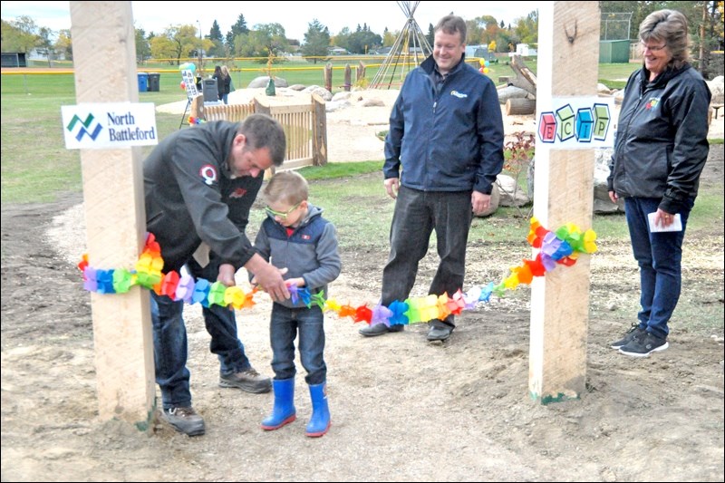 Mayor Ryan Bater speaks at the opening of the new natural spaces park at Centennial Park. Located behind the Civic Centre, the project was spearheaded by Battlefords Early Childhood Intervention Program. The grand opening took place Friday afternoon. Earlier that day, a special pipe ceremony took place to bless the area. Photos by John Cairns (Photo of pipe ceremony submitted)