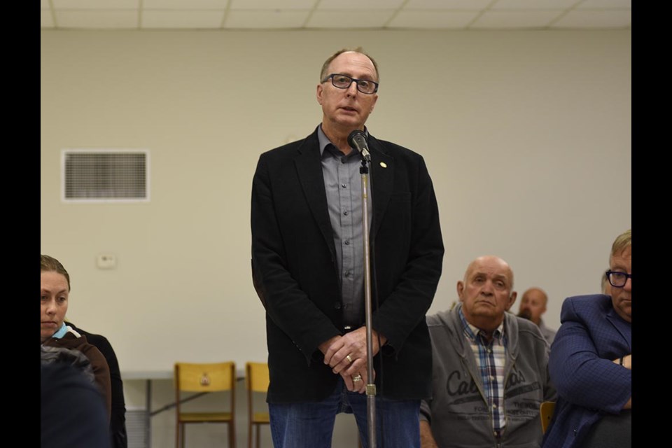 Estevan Mayor Roy Ludwig speaks to attendees at a meeting held in the town of Bienfait on Sept. 13.