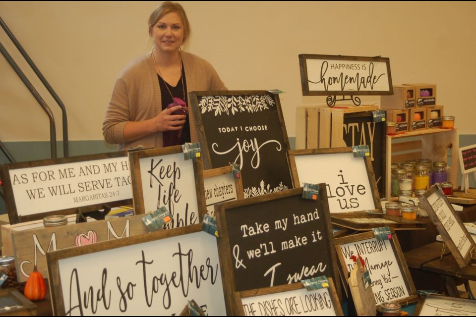 Tricia Prokopchuk displayed home made signs at the Sturgis Kinettes fall market.