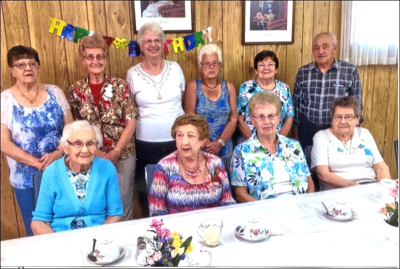 Action Now Seniors celebrating birthdays in July and August were: back row - Mildred Heidle, Margaret Kemp, Ruth Bilanski, Jean Smith, Jeannine Beloin, Dave Manegre; front row – Yvonne Aresenault, Mary Nykiforuk, Rita Peterson and Simon Michaud.