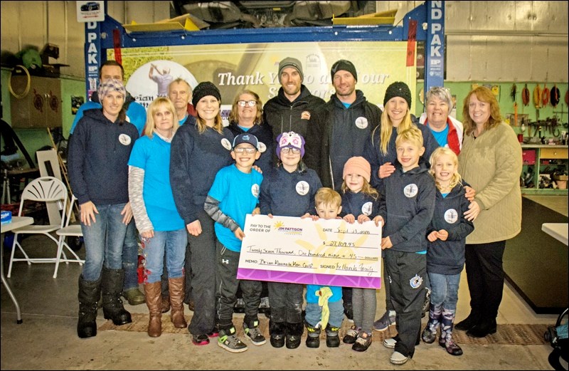 The Maunula family with the cheque presented Jim Pattison Children’s Hospital Foundation.
