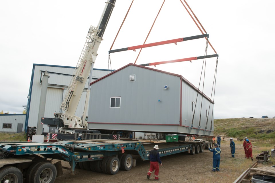 Waterflood1 big skid-7701-3000pThis is the largest skid package that Waterflood Production Systems has produced. It was loaded out of their Estevan facility on Sept. 17, with Skylift Services Ltd. doing the lifting and Bert Baxter Transport Ltd. doing the hauling.