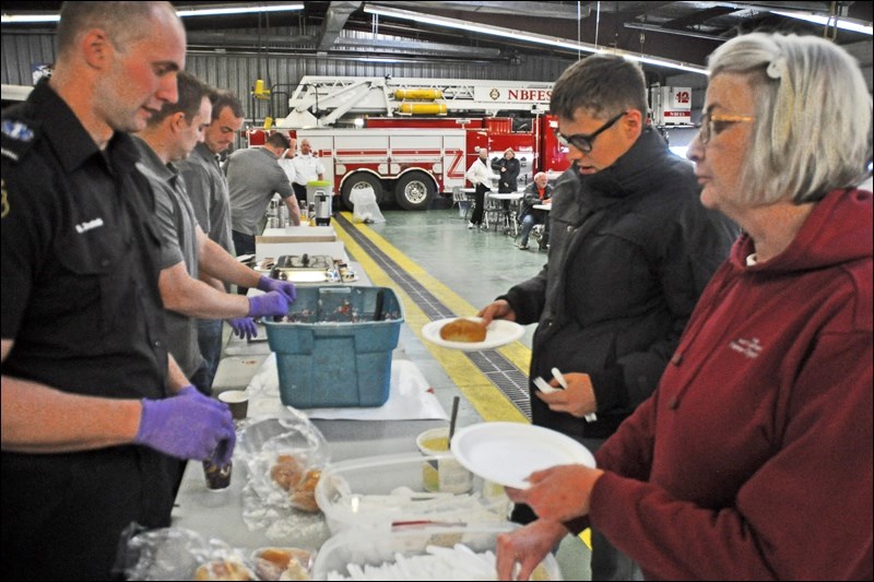 The highlight of the week was the beef on a bun fundraiser at noon Wednesday at the fire hall. Members of the News-Optimist’s editorial department including Becky Doig and Josh Greschner were there to enjoy the food and to support the efforts of the fire department. Photos by John Cairns