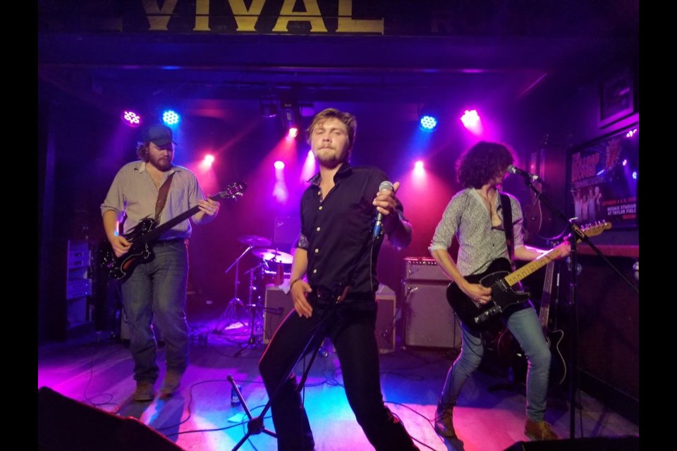 Regina-based blues and rock n’ roll band Dead Levee has direct ties to Kamsack with band member “Boss Man” Rylan Klapatiuk, right. At left is Parker Cochrane, bass guitarist and centre is vocalist Dane Von Hagen while playing onstage at the Revival music room in Regina