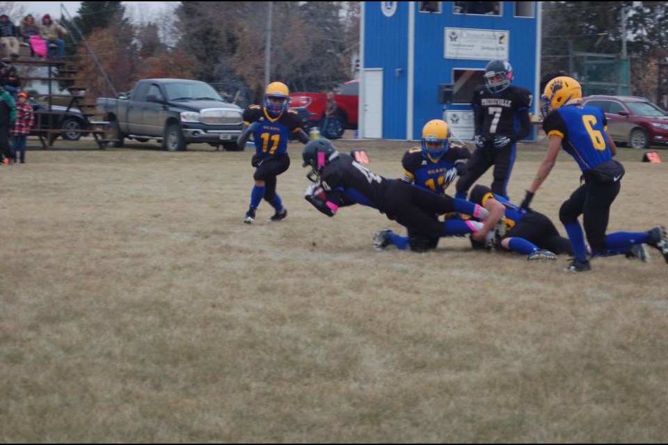 Willen Paligan was stopped in his tracks when he was tackled by a Porcupine Plain player.