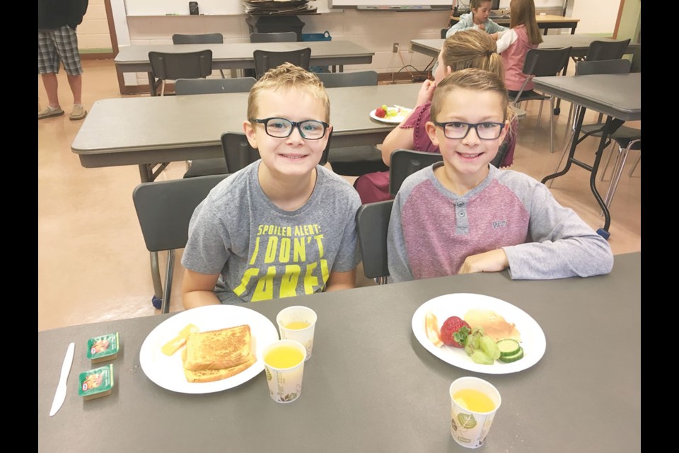 Liam Flavell, left, and Charlie Hayes are among the young people who enjoy attending the Hillcrest Breakfast Club. Photo submitted