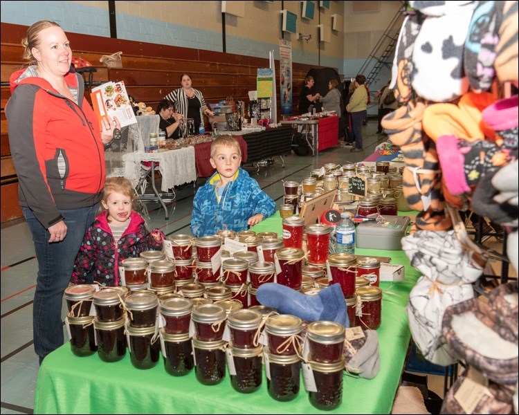 A family shops for homemade jelly by Kelly Schmidt